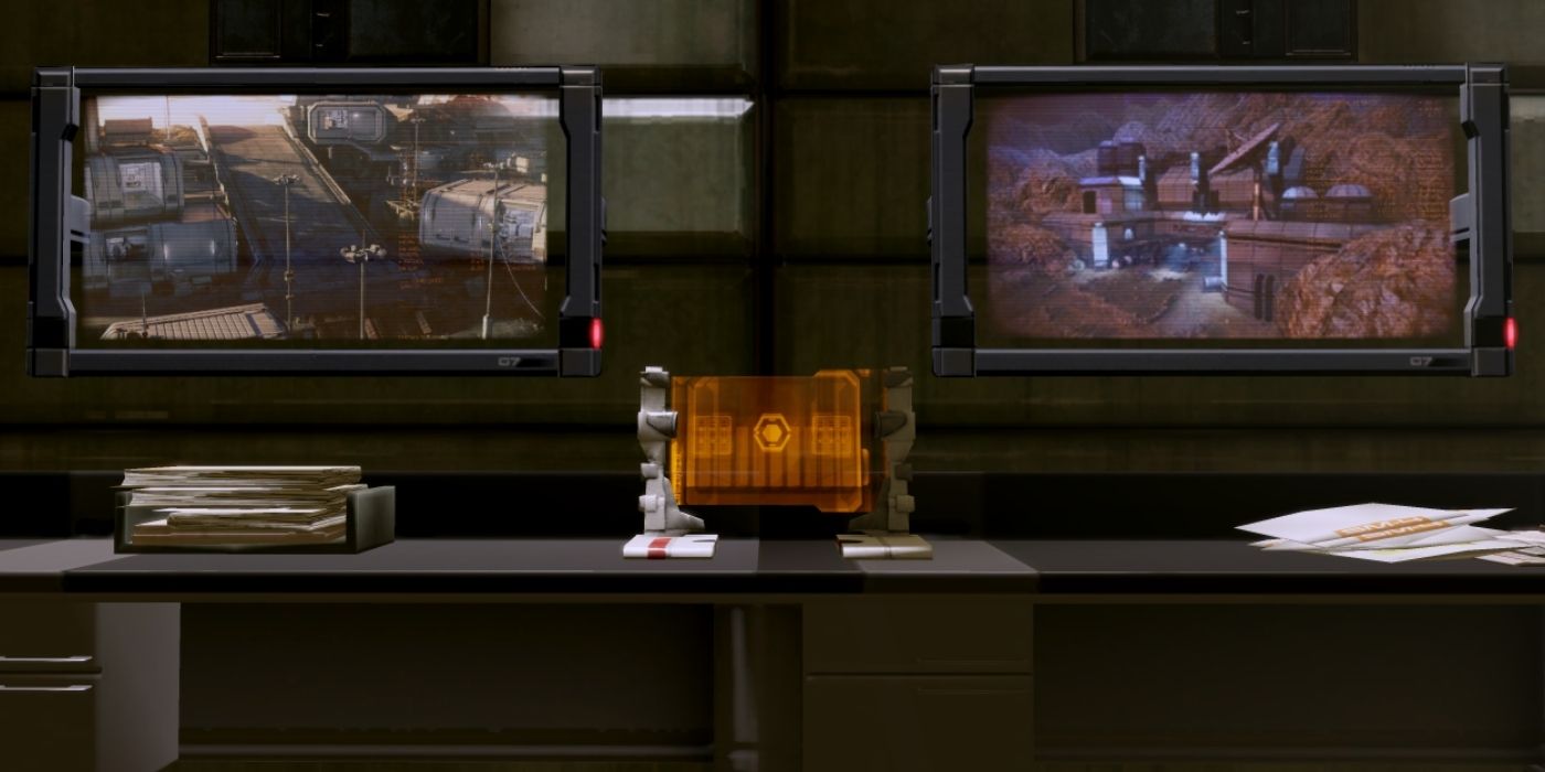 N7 Javelin Missiles Critical Decision Point - Gameplay Screenshot From Mass Effect depicting two computer monitors showing two separate camera feeds of a populated city